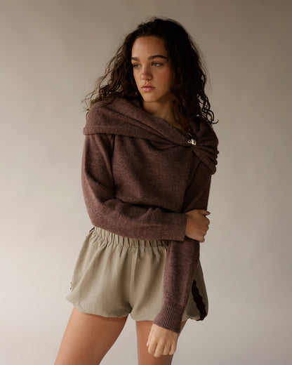 Mocha brown off-shoulder knit sweater with draped neckline and ribbed cuffs