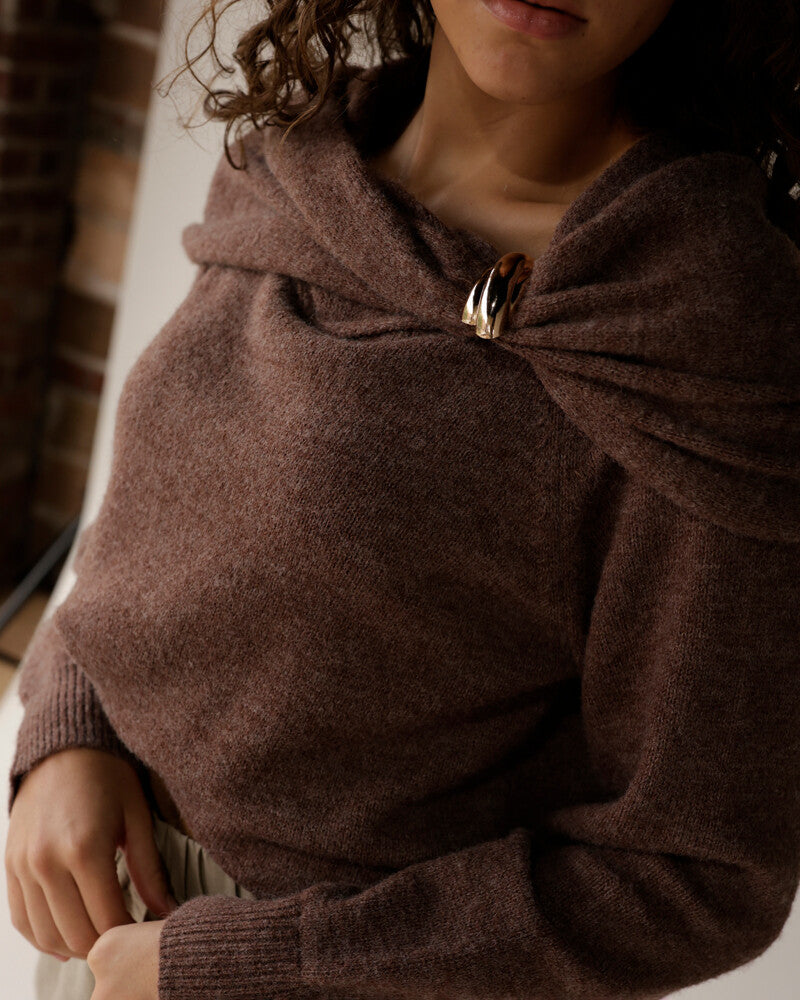 Mocha brown knit sweater with draped neckline secured by gold ring clasp