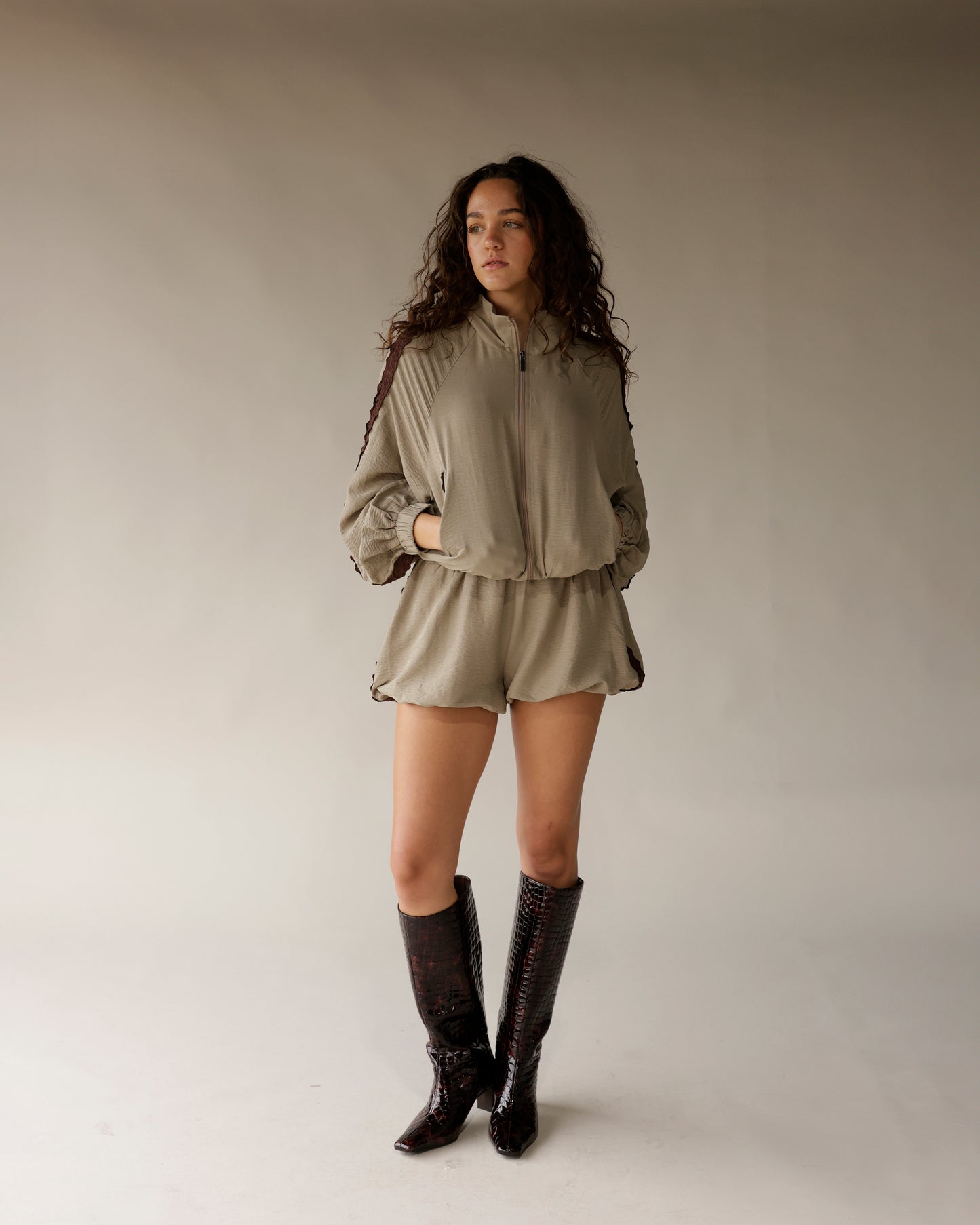 Dark brown crocodile embossed tall knee-high boots with block heel, tortoise print