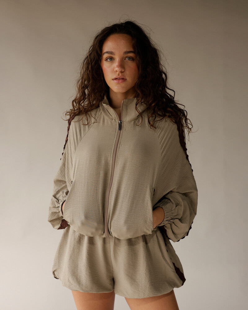 Taupe zip-up jacket and matching Zebra Strut Shorts set by Bucketlist