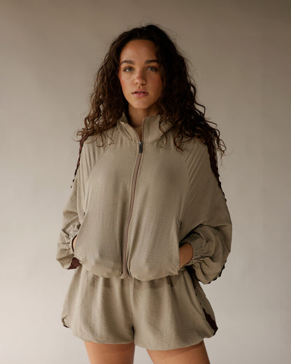 Taupe zip-up jacket and matching Zebra Strut Shorts set by Bucketlist