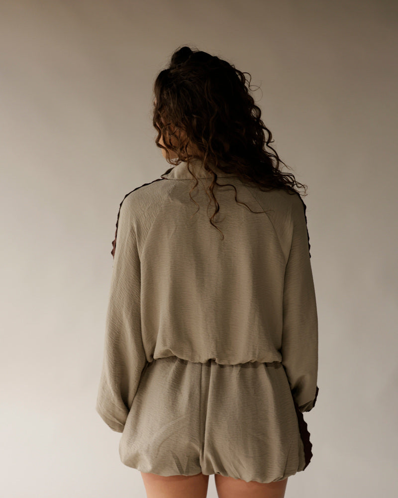 Sage green long sleeve top and matching bubble shorts set, back view