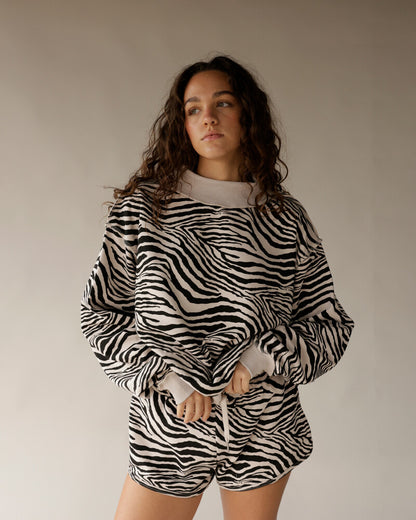 Oversized zebra print mock neck sweatshirt in black and white with matching shorts