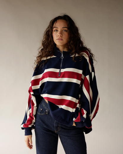 Navy, red, and white stripe quarter-zip pullover sweatshirt with ring zipper pull