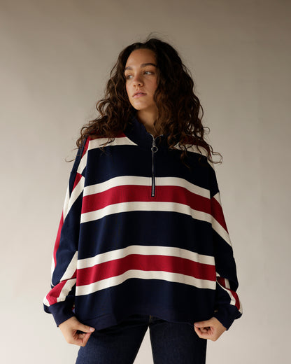 Navy, red, and white striped quarter-zip pullover sweatshirt with ring zipper pull
