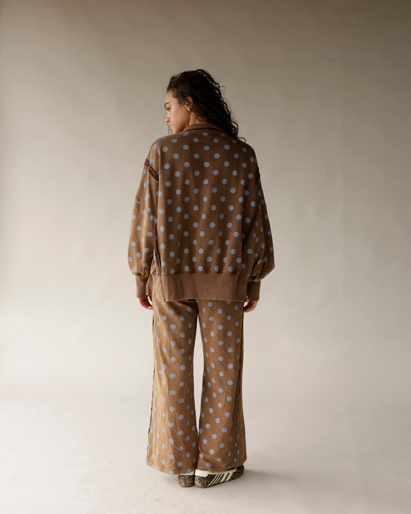 Mocha brown polka dot flare lounge pants with blue dots, back view
