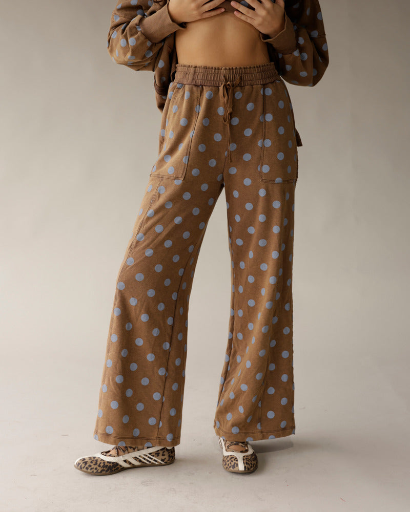 Mocha brown wide-leg lounge pants with blue polka dots and drawstring waist