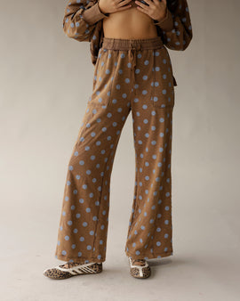 Mocha brown wide-leg lounge pants with blue polka dots and drawstring waist