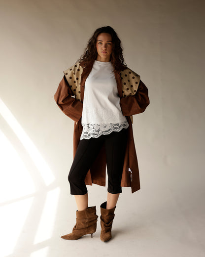 Oversized brown trench coat with detachable beige polka dot scarf collar