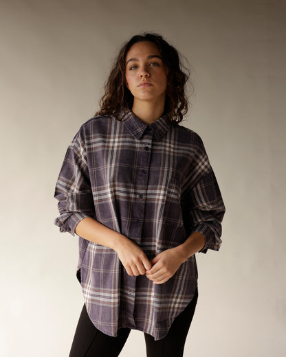 Oversized navy plaid flannel button-up shirt with collar and rolled sleeves