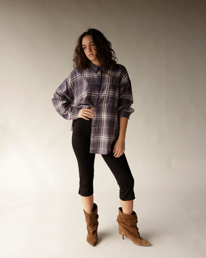 Oversized navy plaid flannel button-up shirt with drop shoulders and chest pocket