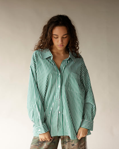 Oversized green and white striped button-up shirt with chest pocket and long sleeves