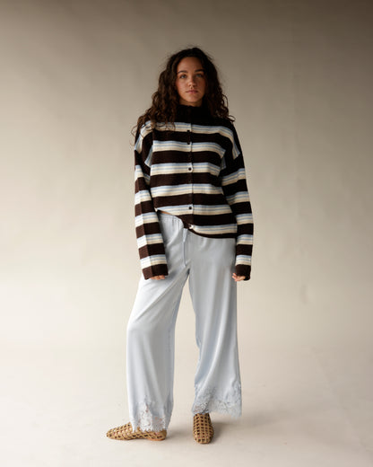 Brown striped mock neck button-up cardigan with blue and cream horizontal stripes