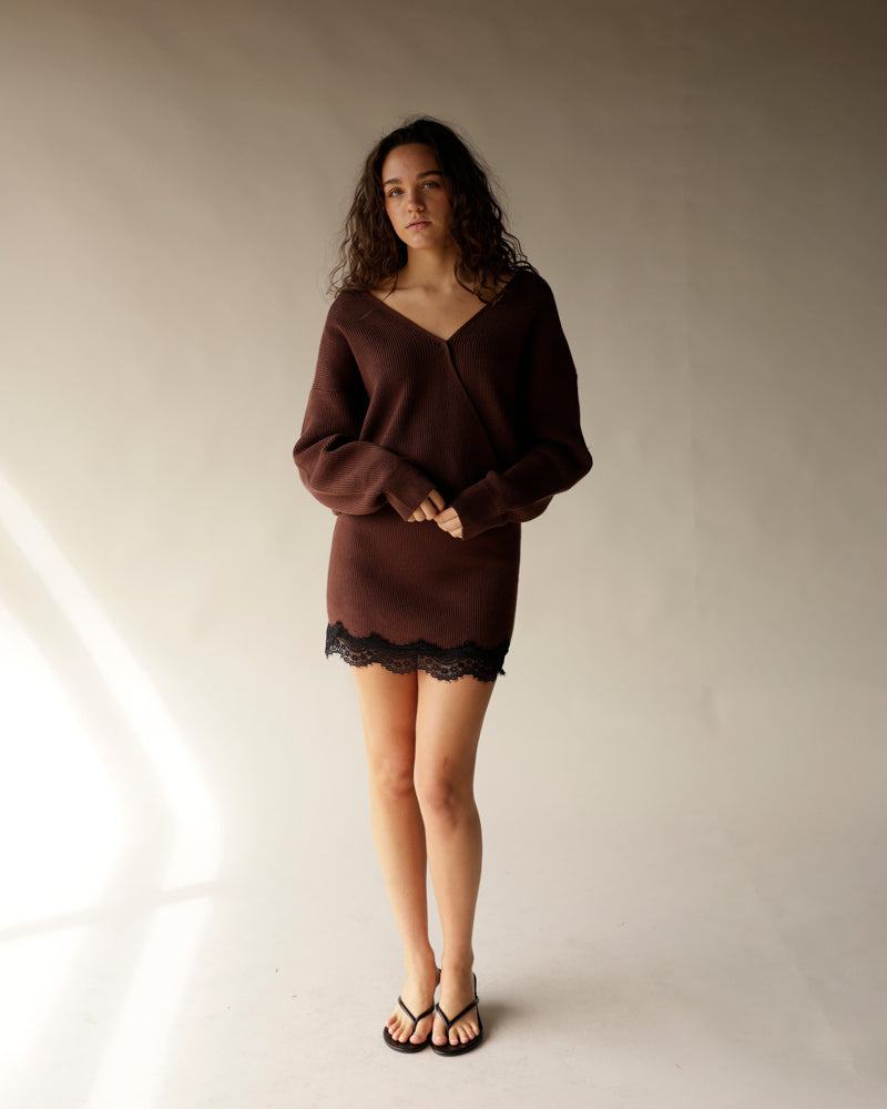 Brown ribbed knit V-neck sweater mini dress with black lace hem and long sleeves