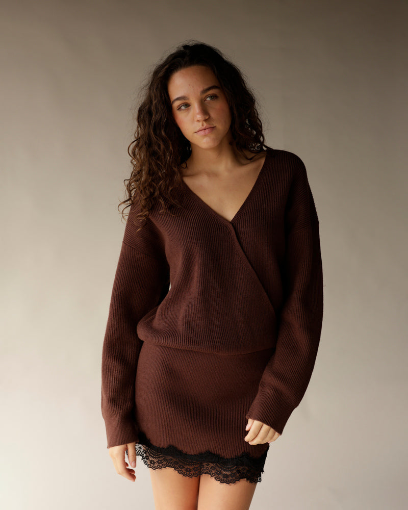 Chocolate brown ribbed knit mini dress with V-neck and black lace hem trim