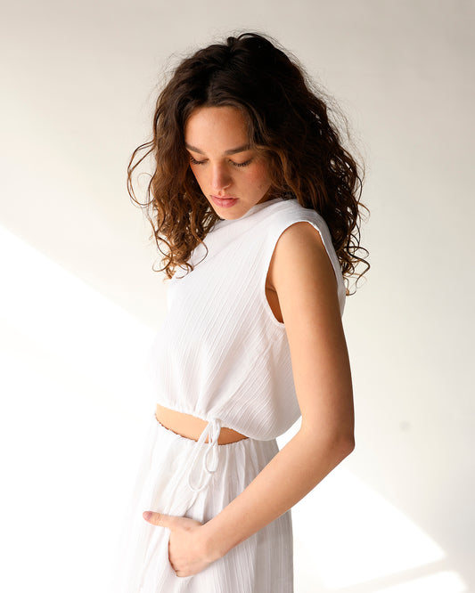 white sleeveless textured top with side ties