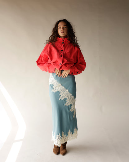 Dusty blue satin midi skirt with diagonal white lace trim detail
