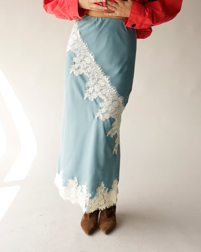 Dusty blue satin midi skirt with diagonal white lace appliqué trim detail