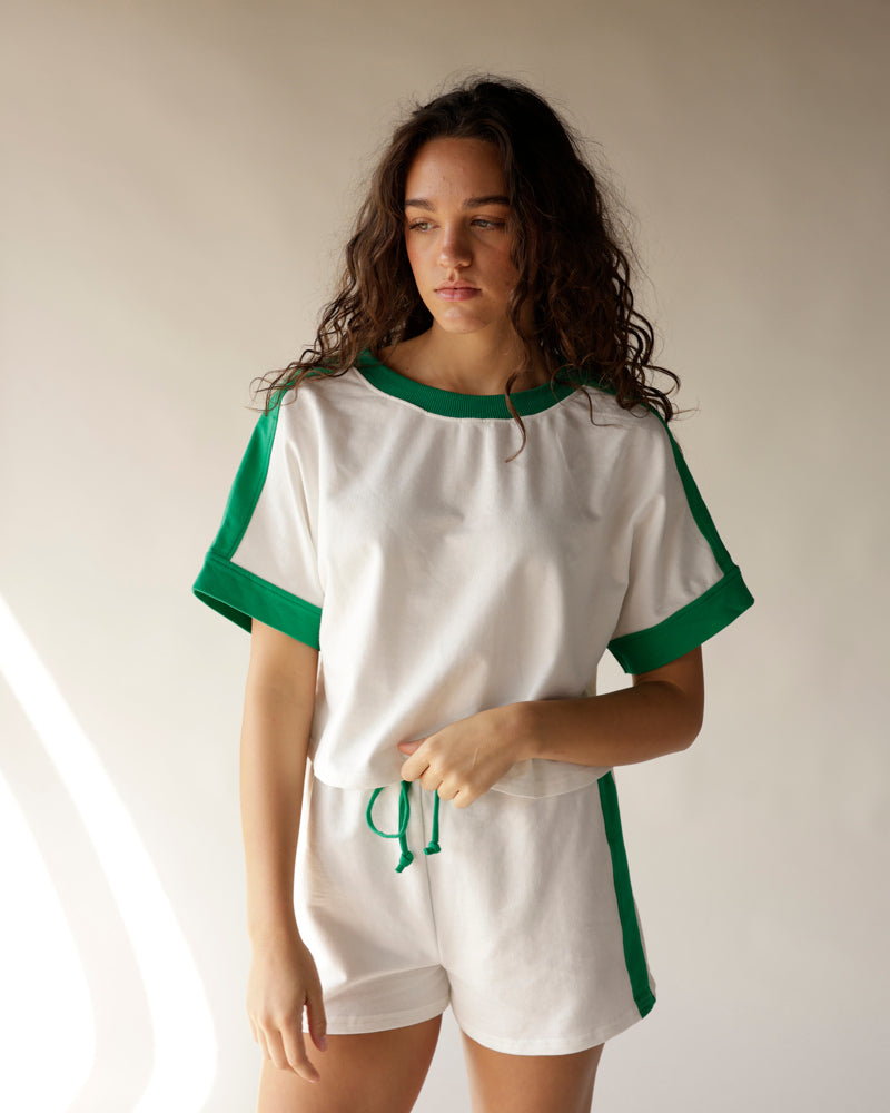 White and green two-piece short set with contrast trim and drawstring waist