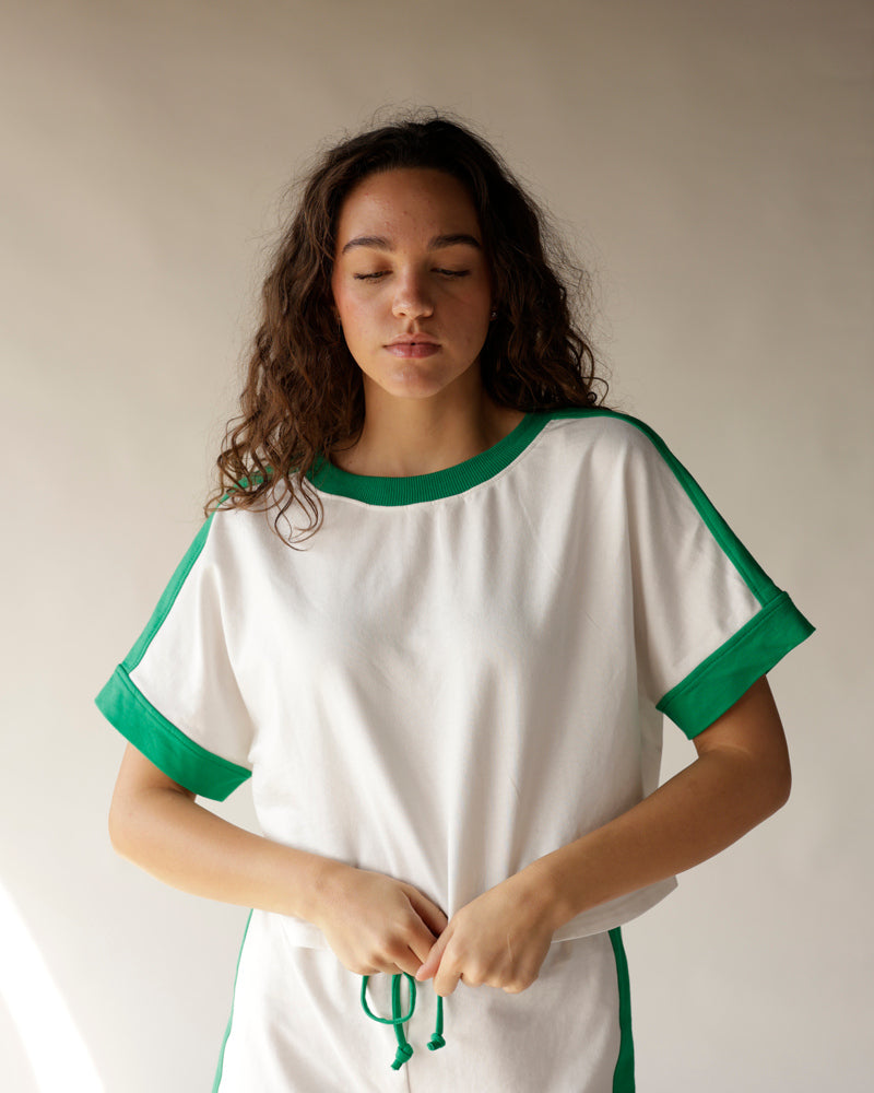 White and green cropped ringer tee with side stripe and drawstring shorts set