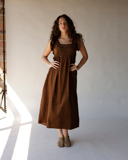 Brown dotted corduroy midi dress with ruffle straps, smocked bodice, and full skirt