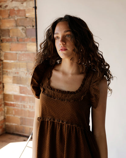 Brown dotted corduroy midi dress with ruffle neckline and flutter sleeves