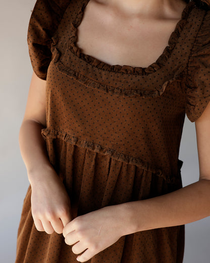 Brown polka dot corduroy midi dress with ruffled square neckline and puff sleeves