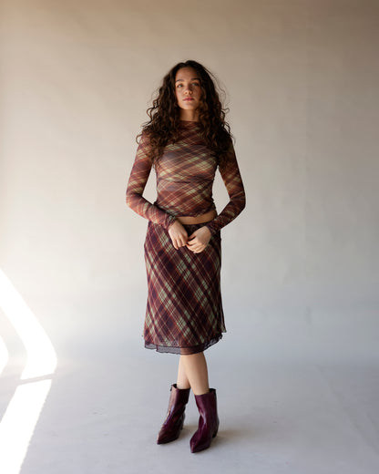 Brown plaid mesh long sleeve crop top with semi-sheer fabric and fitted silhouette