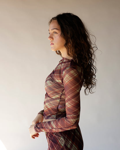Burgundy plaid mesh long sleeve mock neck top worn as a fitted set