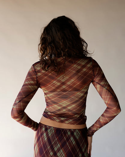 Brown plaid mesh long sleeve crop top shown from back on model