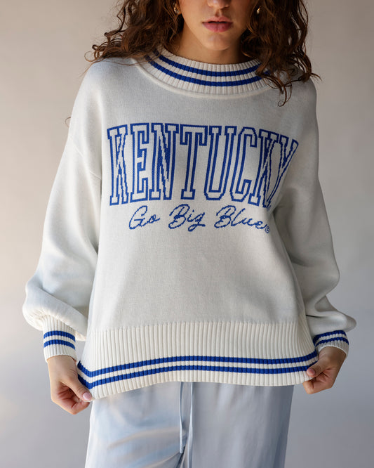 Cream knit Kentucky Go Big Blue sweater with blue stripes and varsity lettering