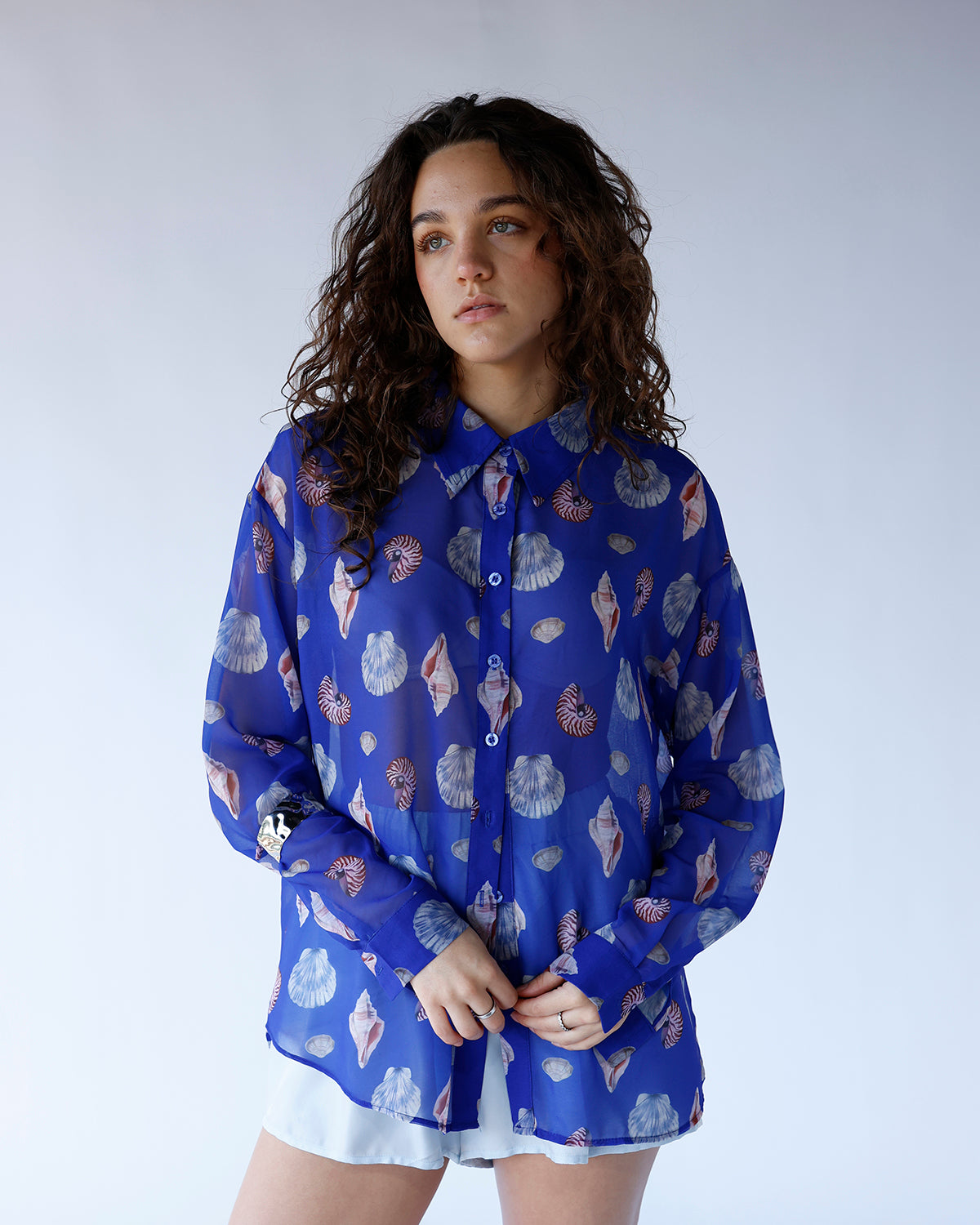 sheer long sleeve blue seashell print button up 