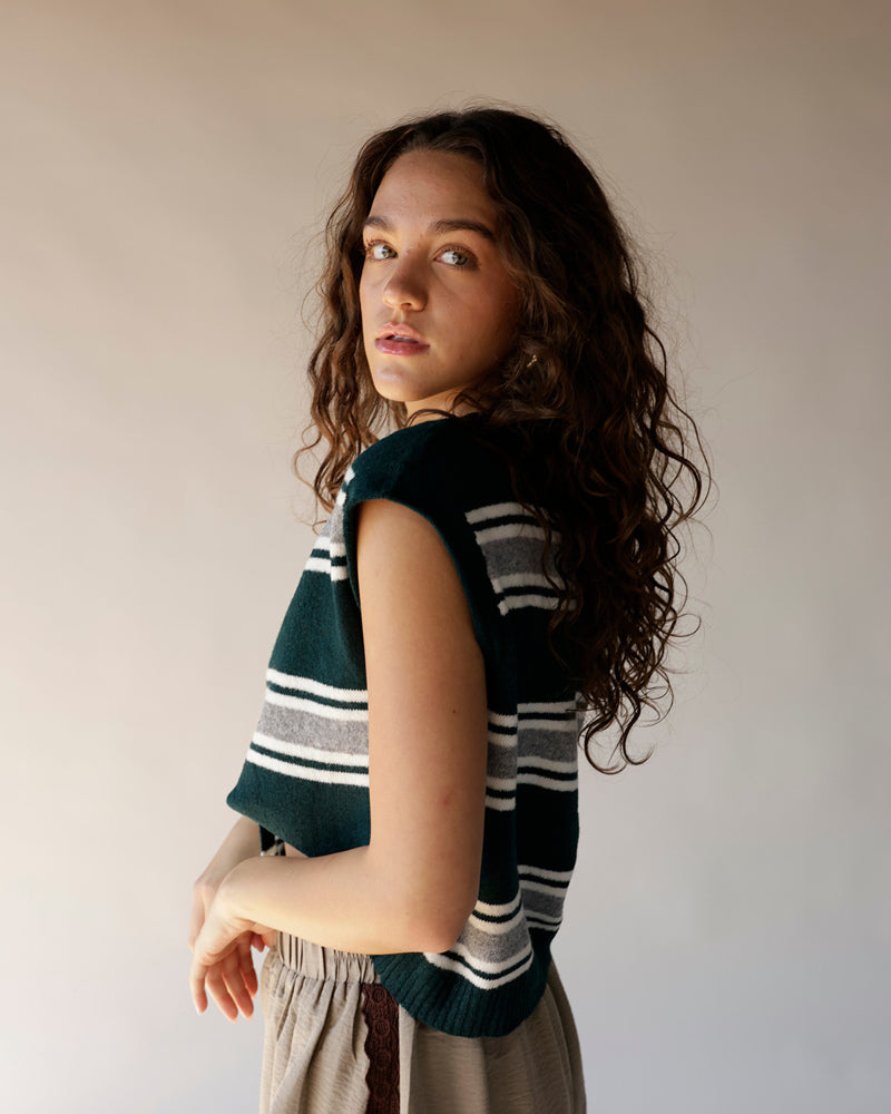 Dark green striped knit cropped vest with white and grey horizontal stripes
