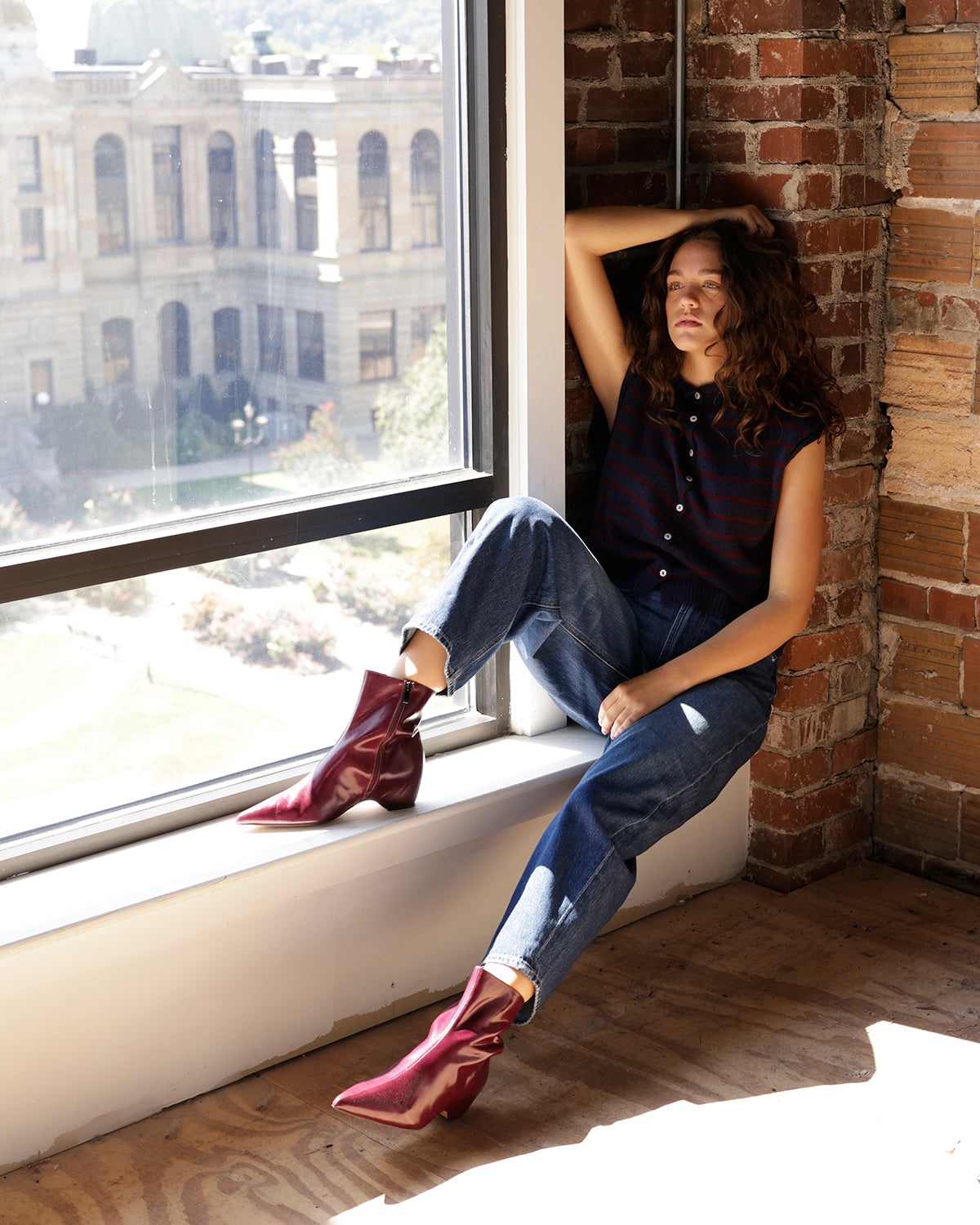 Maroon leather pointed-toe ankle booties with low block heel and side zip