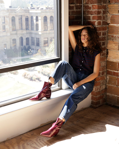 Maroon leather pointed-toe ankle booties with low block heel and side zip