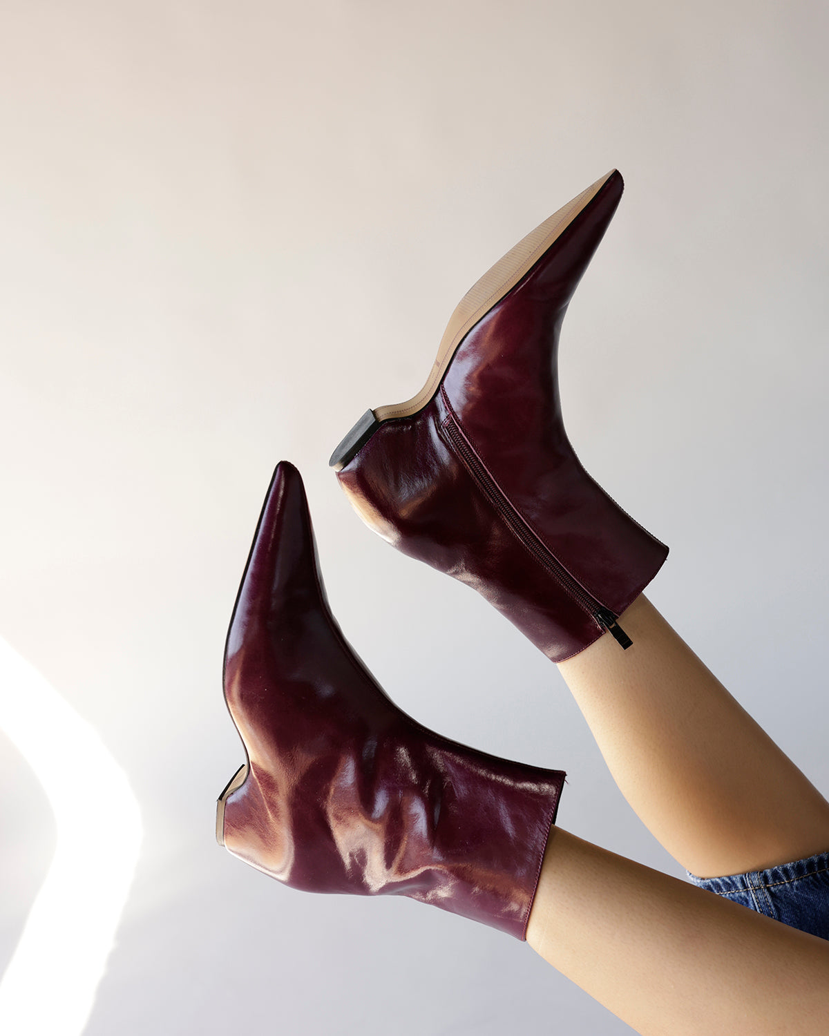 Steve Madden maroon leather ankle booties with pointed toe and side zipper