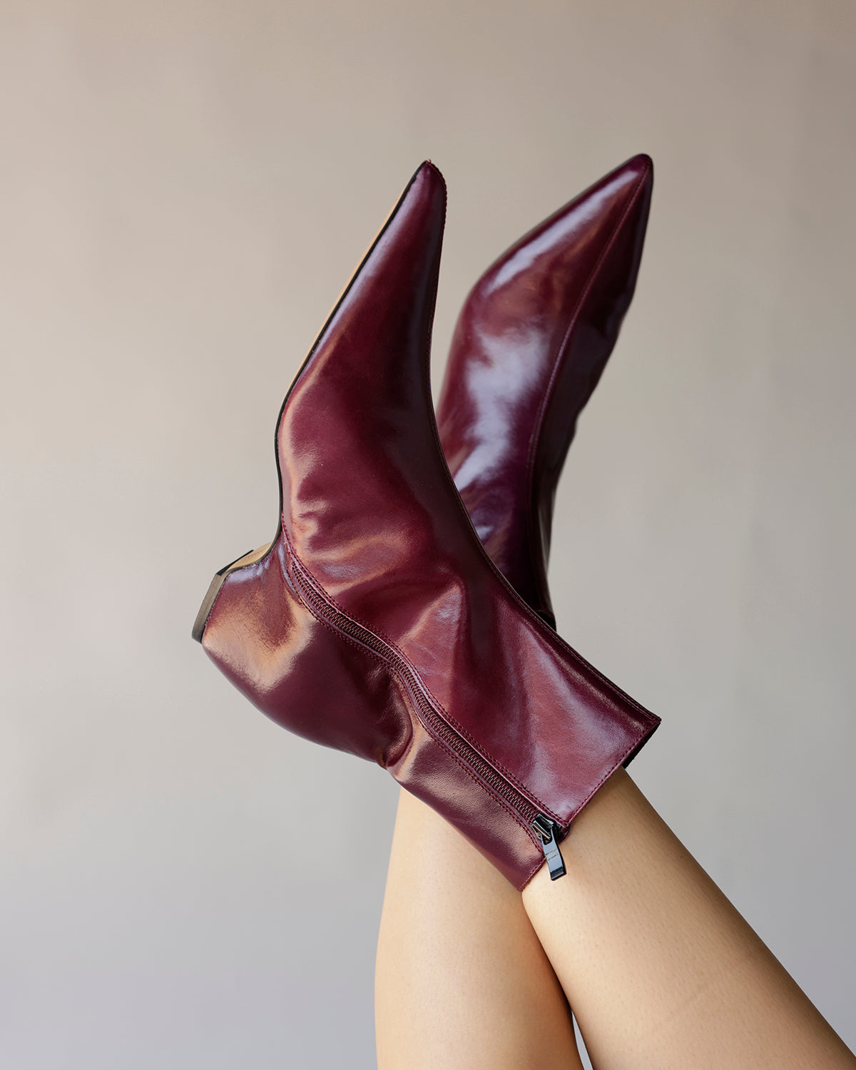 Steve Madden maroon leather ankle booties with pointed toe and side zipper
