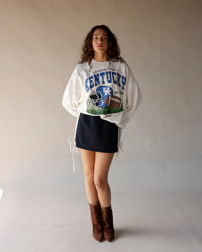 Oversized white University of Kentucky graphic crewneck sweatshirt with blue lettering