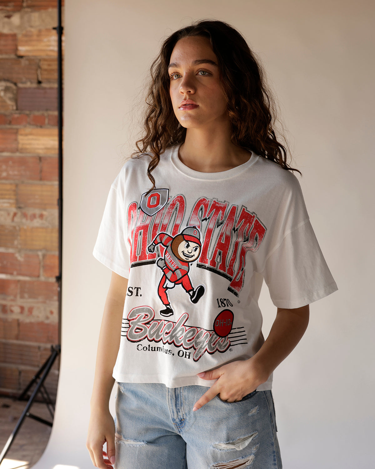 White oversized graphic tee featuring Ohio State Buckeyes Brutus mascot print