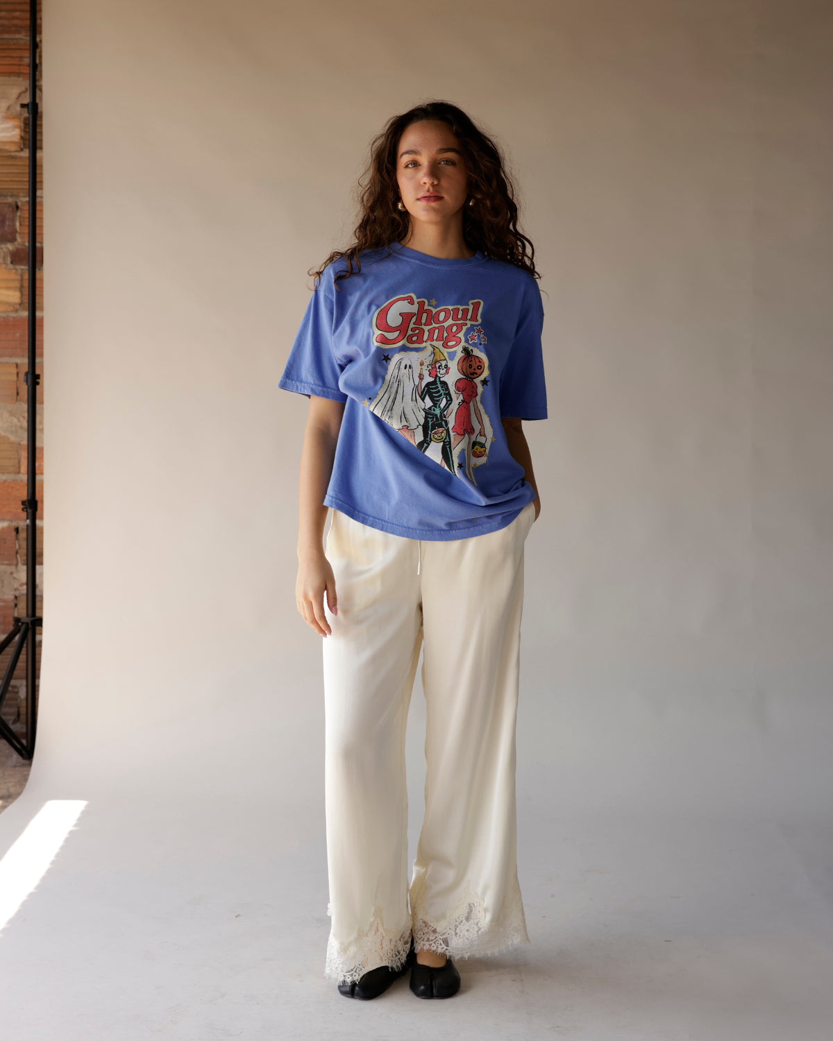 Blue oversized graphic tee with Ghoul Gang Halloween print featuring ghost, skeleton, pumpkin characters