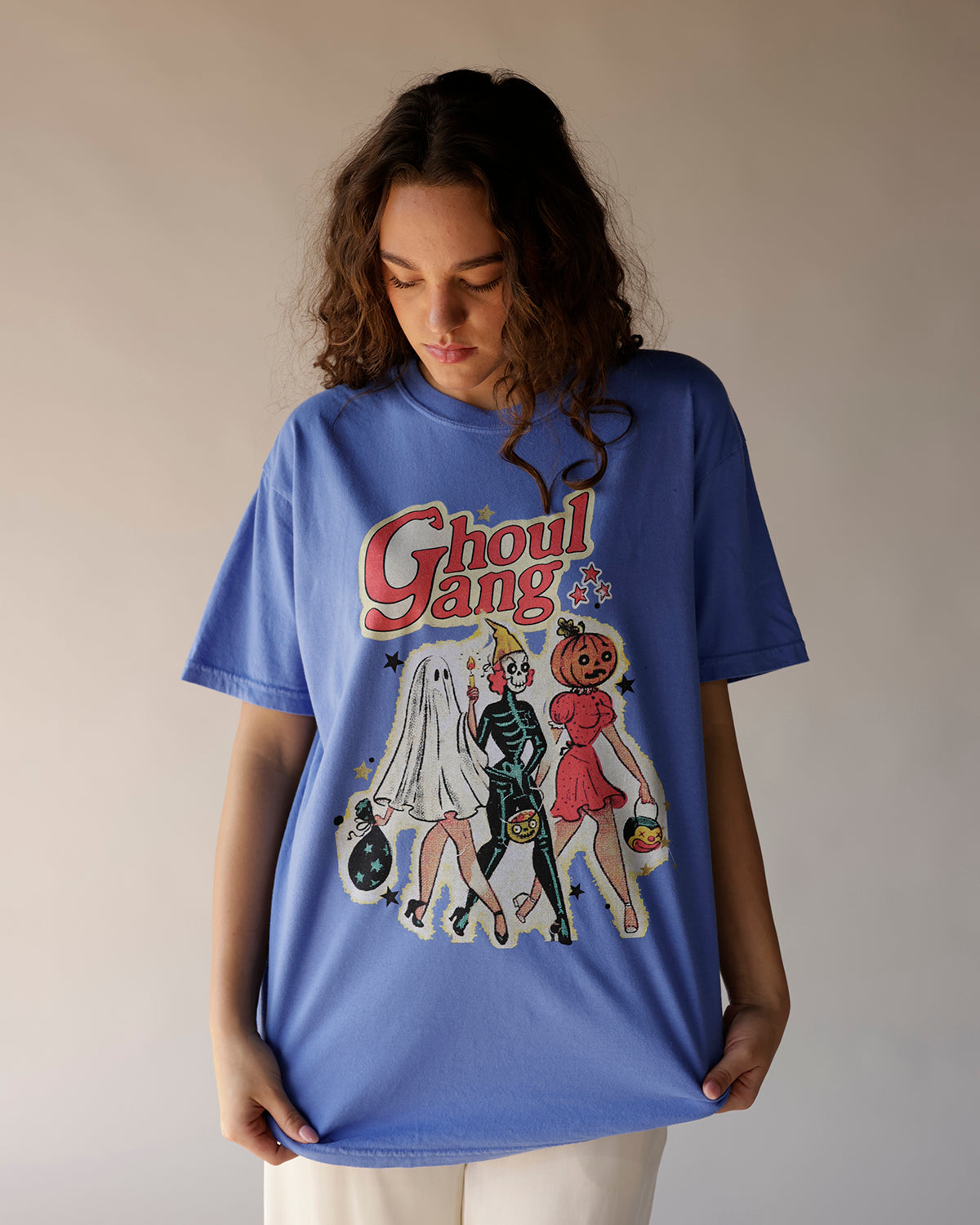 Blue oversized graphic tee with retro Halloween Ghoul Gang print featuring ghost, skeleton, pumpkin