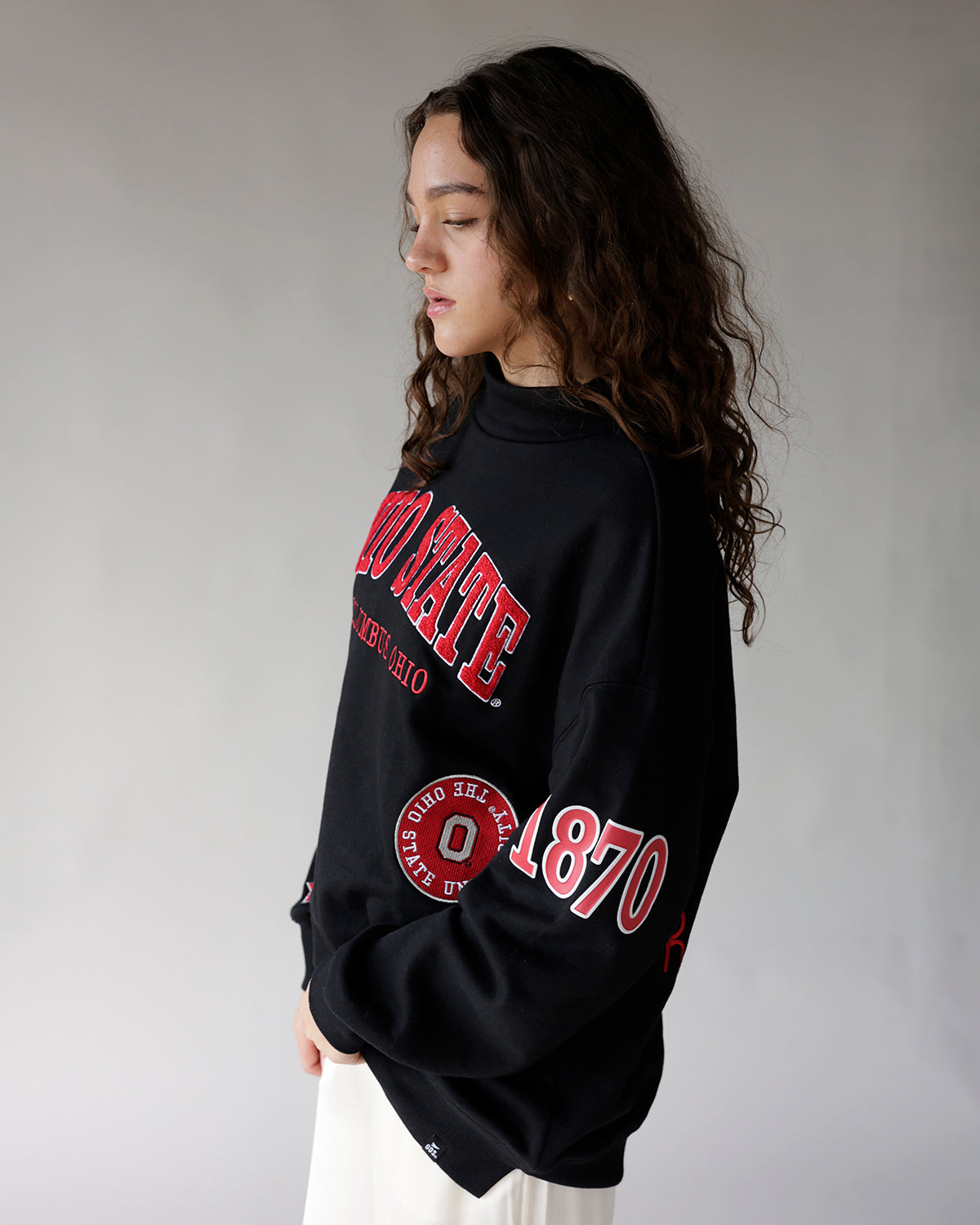 Black oversized crewneck sweatshirt with red Ohio State graphics and 1870 sleeve print