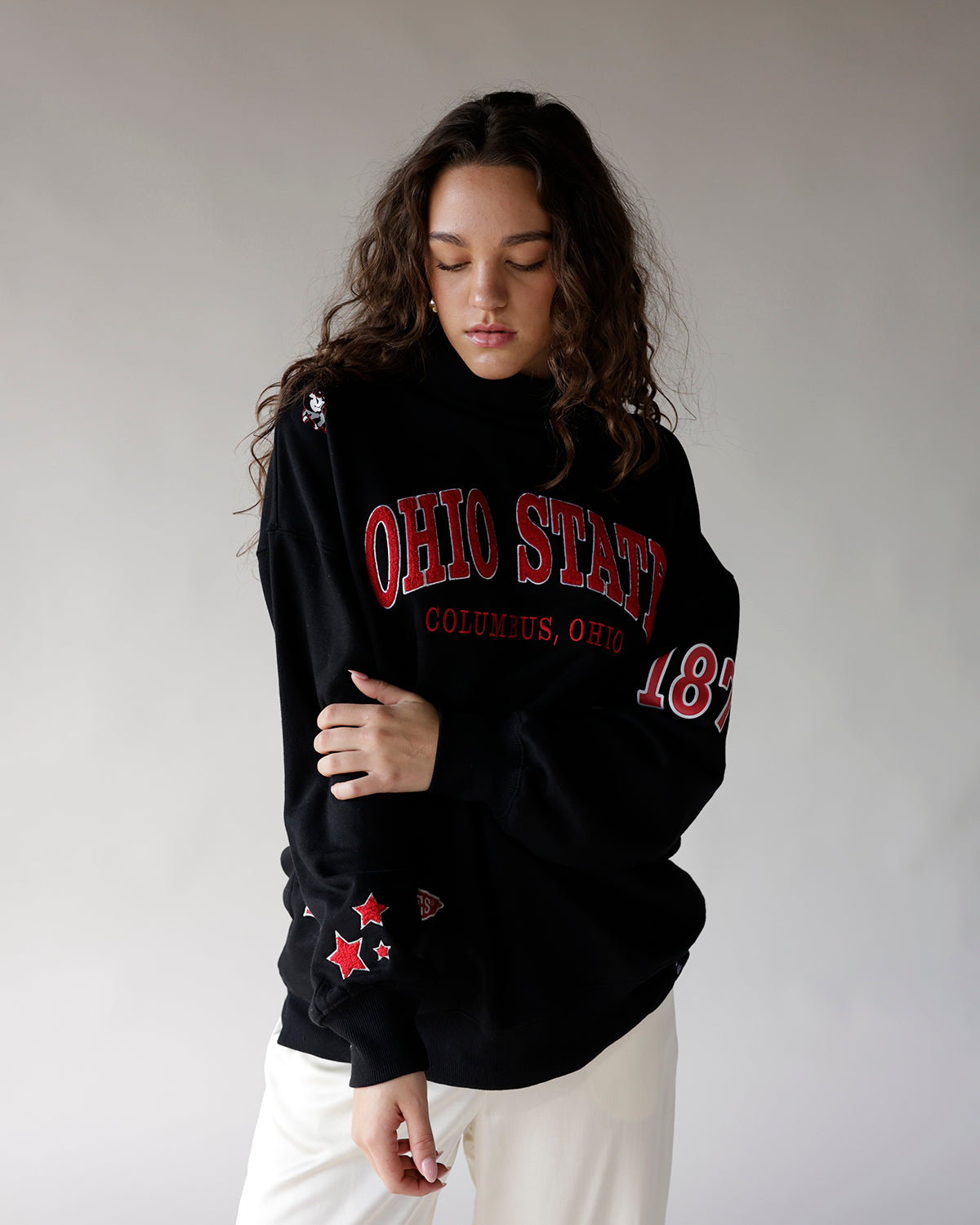Black oversized sweatshirt with red Ohio State Columbus Ohio graphic and star sleeve detail