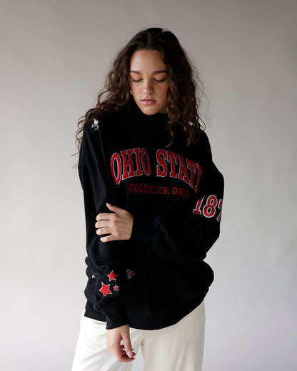 Black oversized sweatshirt with red Ohio State Columbus Ohio graphic and star sleeve detail