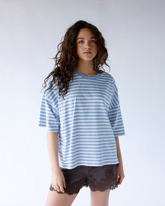 light blue and white striped short sleeve tee with dropped shoulders