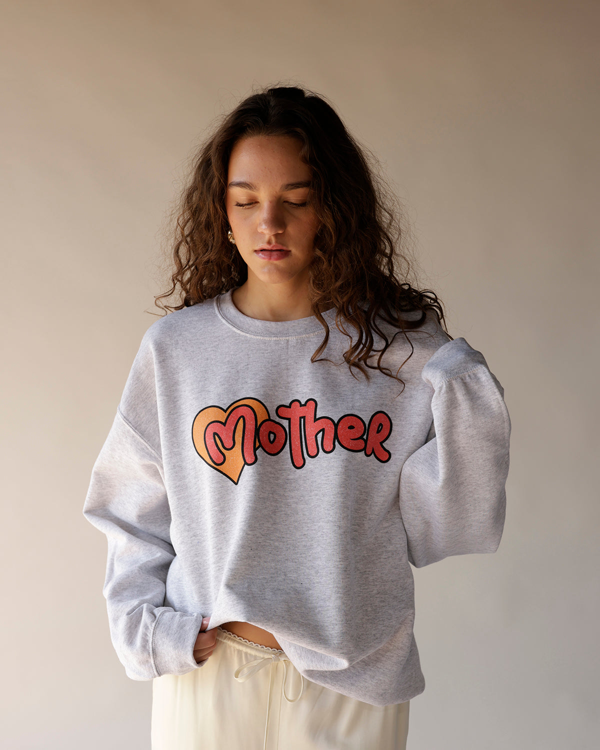 Heather gray crewneck sweatshirt with retro heart and Mother graphic print