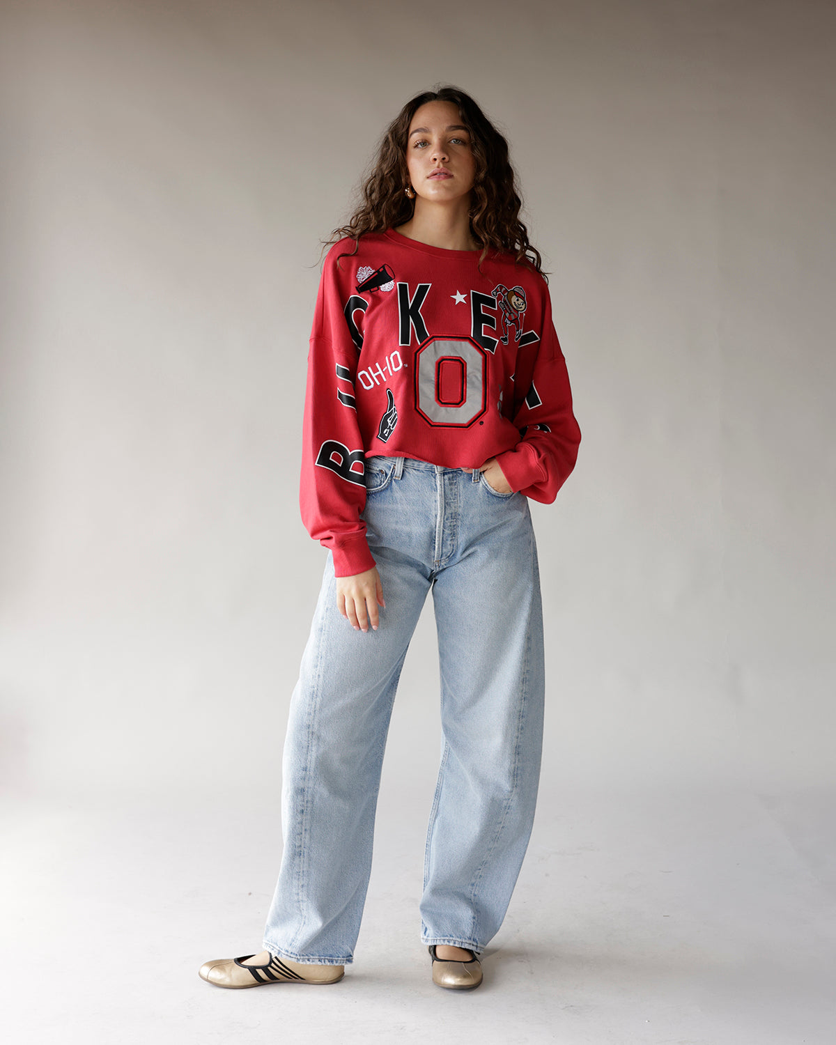 Red Ohio State Buckeyes graphic crop sweatshirt with varsity lettering and patches