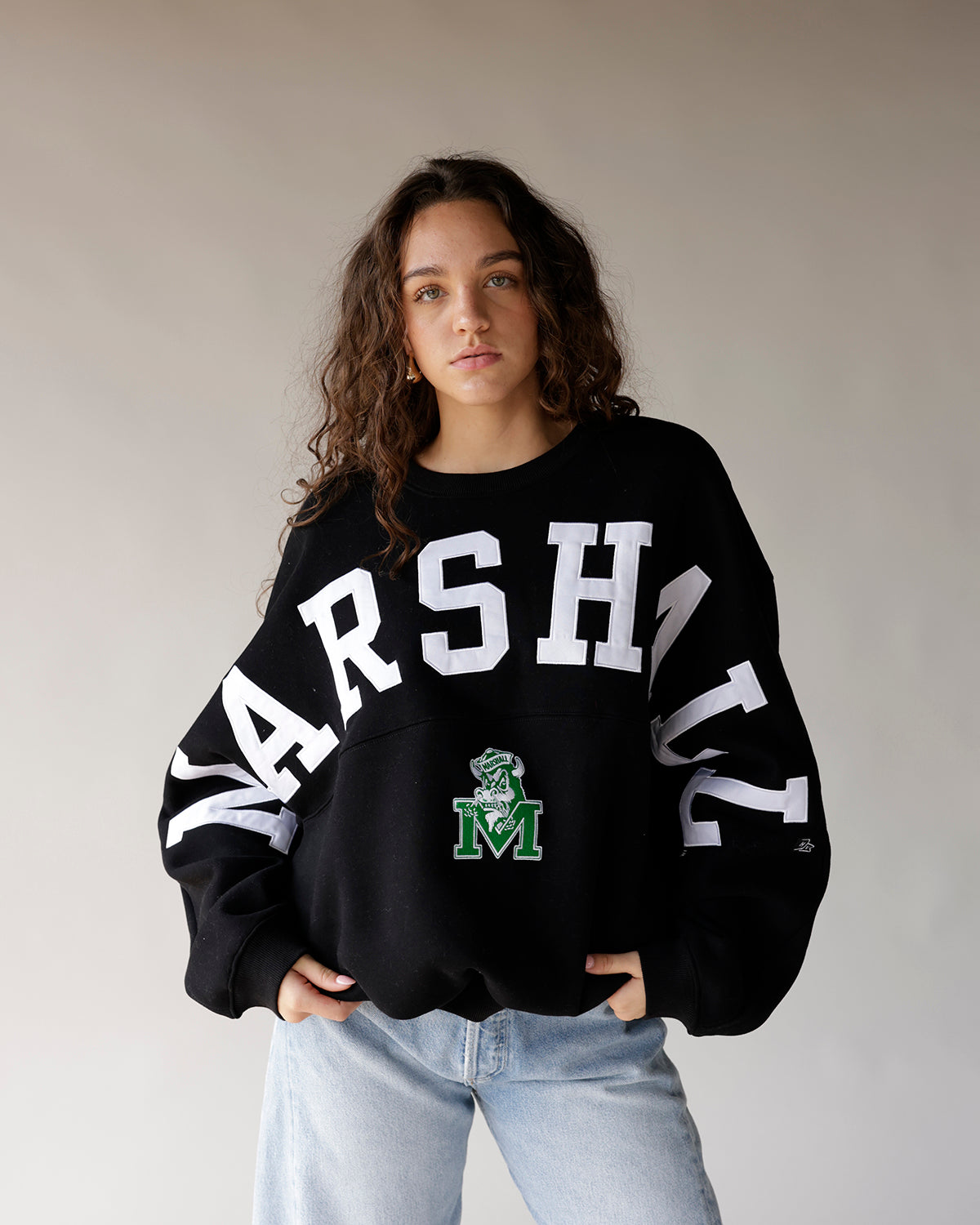 Black Marshall varsity crewneck sweatshirt with white lettering and green M logo