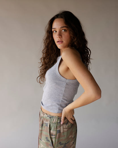Gray heather racerback crop tank top, fitted, scoop neck, worn with camo pants