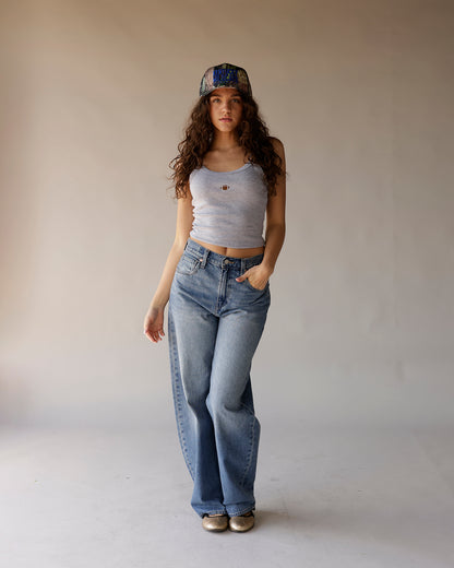 Gray ribbed crop tank top with small football embroidery on chest